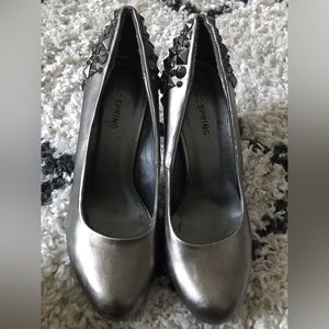 Call it Spring gunmetal Pumps with studs in back